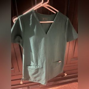 Woman’s FIGs hunter green scrub set. Medium/medium petite